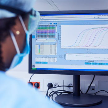 Lab worker working on computer