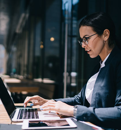 Women typing on computer