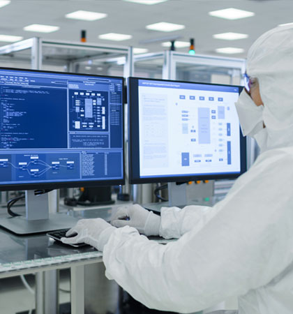 Lab worker on computer