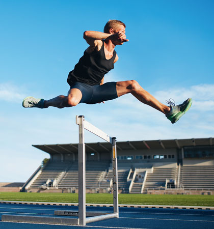 Man running hurdles
