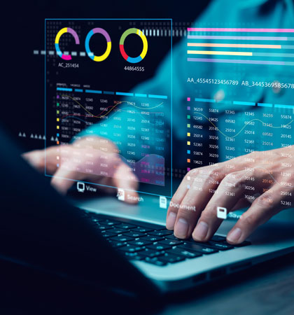 Man working on computer with data floating