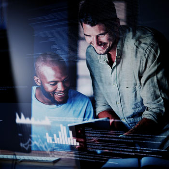 Coworkers collaborating on a computer