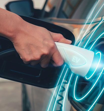Car charging port with electric blue circles around it