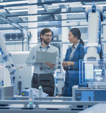 Workers collaborating in factory